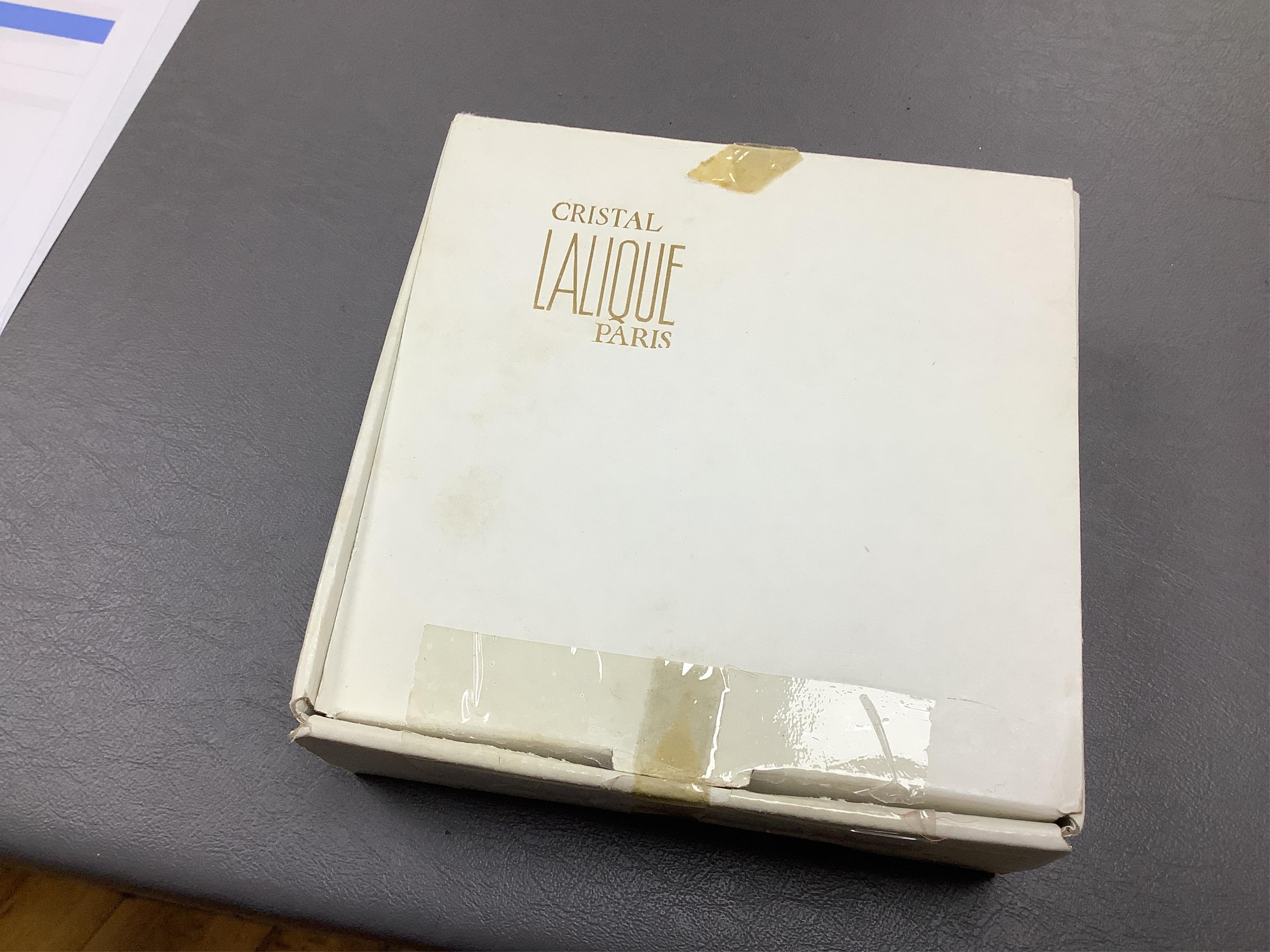 A Lalique crystal frosted glass Bison on polished clear glass paperweight paperweight (boxed), 12cm wide x 10cm high